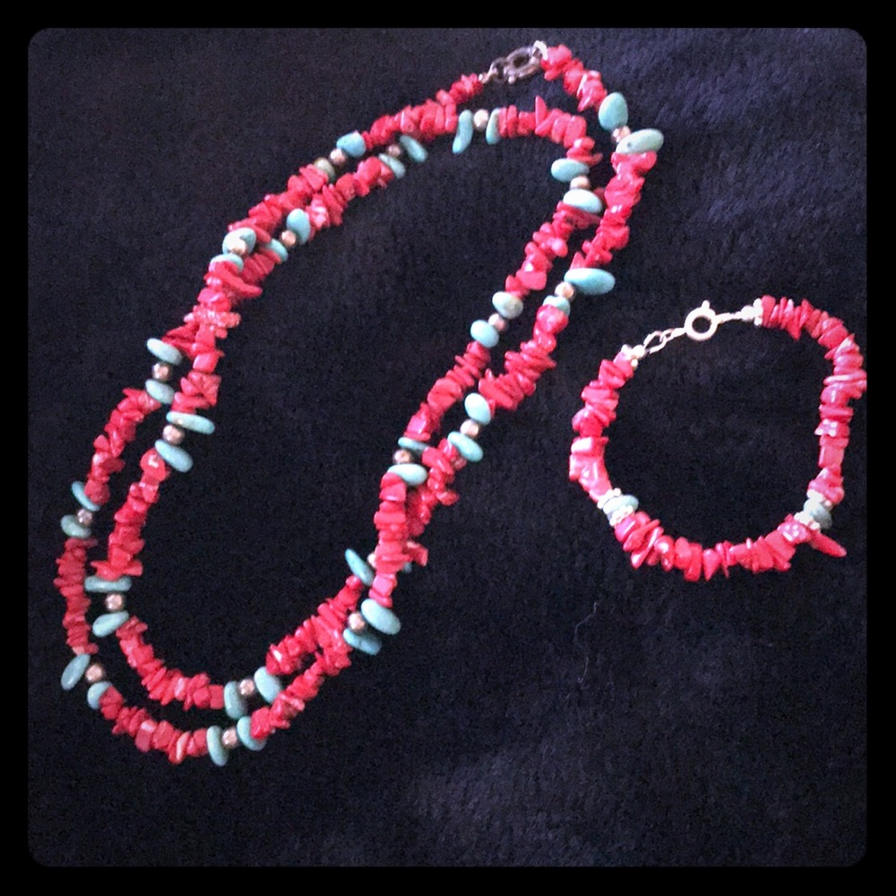 Necklace and bracelet, red and blue stones.